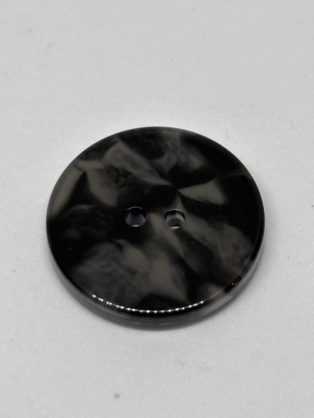 Button 2025 Black, 18mm, 22mm, 25mm polyester button with 2 holes. Boton