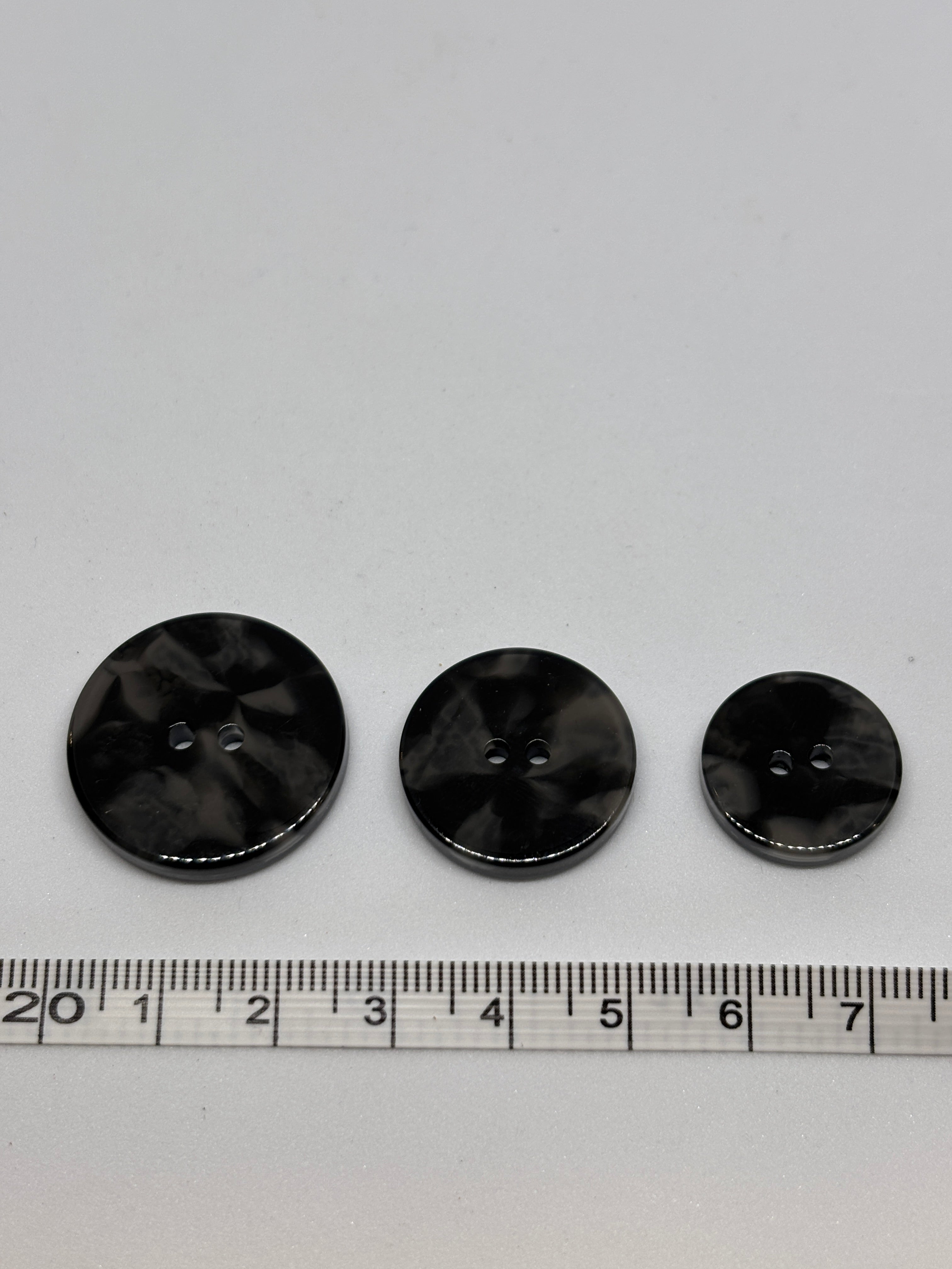 Button 2025 Black, 18mm, 22mm, 25mm polyester button with 2 holes. Boton