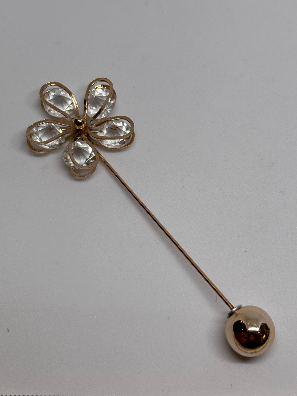 Brooch C 1472 featuring a flower design with crystal petals and a shiny ball end, elegant brooch for any occasion. broche